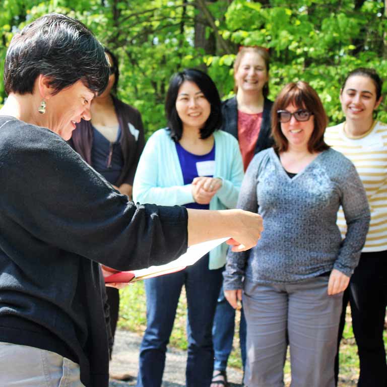 Retreat participants are led in an outdoor exercise